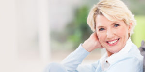 patient smiling after dental implants procedure Inwood WV